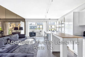 Bright and modern living room in Apartment Lamartine, Paris, with sofa, coffee tables, and large windows